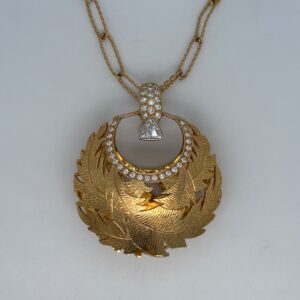 18 Karat Yellow Gold And Diamond Pendant With Leaf Engravings